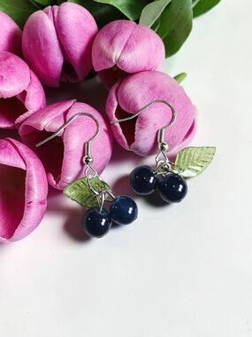 Handcrafted Navy Cherry Drop Earrings with Green Leaf Accents